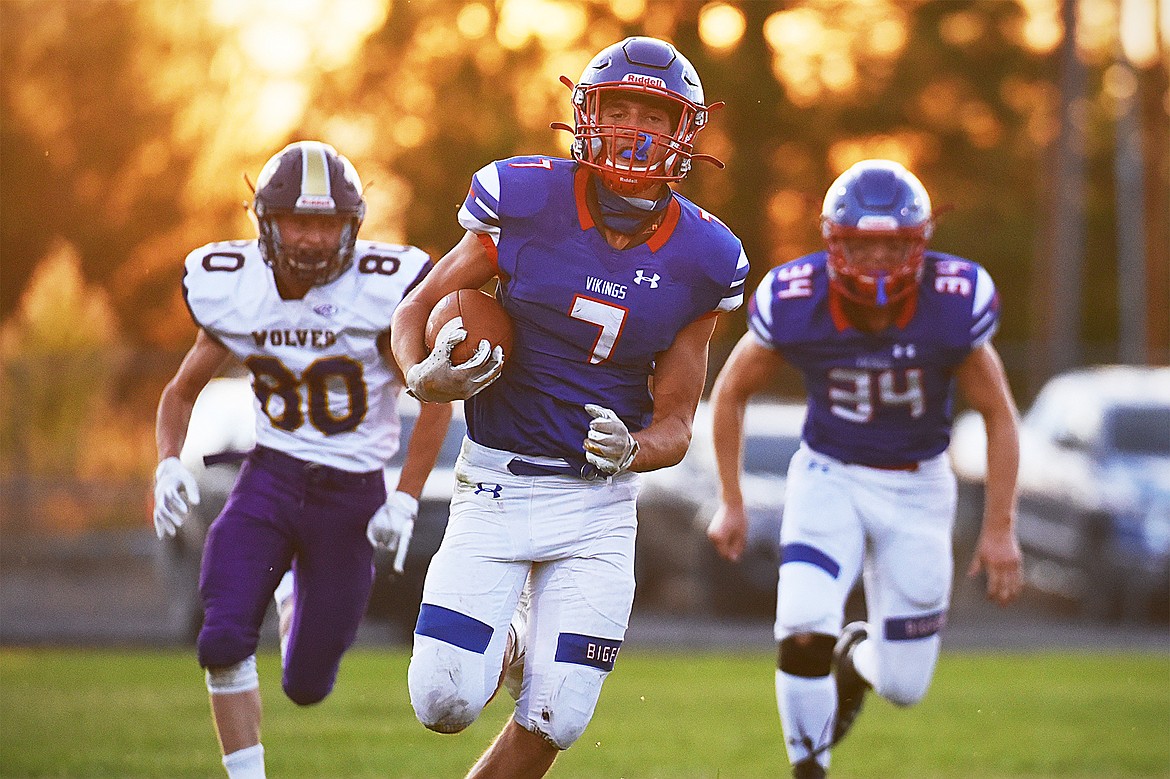 Bigfork running back Cormac Benn (7) breaks free for a 62-yard touchdown run in the second quarter against Cut Bank at Bigfork High School on Friday. (Casey Kreider/Daily Inter Lake)