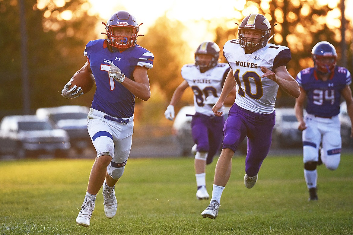 Bigfork running back Cormac Benn (7) breaks free for a 62-yard touchdown run in the second quarter against Cut Bank at Bigfork High School on Friday. (Casey Kreider/Daily Inter Lake)