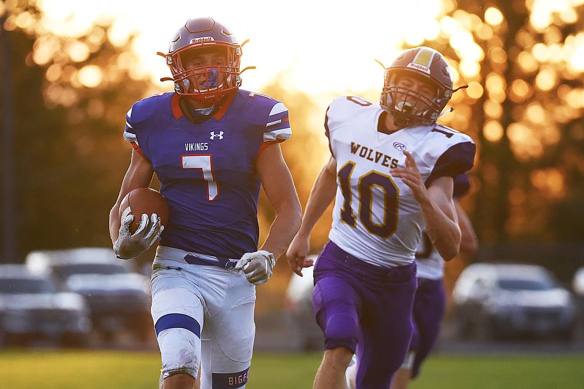 Bigfork running back Cormac Benn (7) breaks free for a 62-yard touchdown run in the second quarter against Cut Bank at Bigfork High School on Friday. (Casey Kreider/Daily Inter Lake)