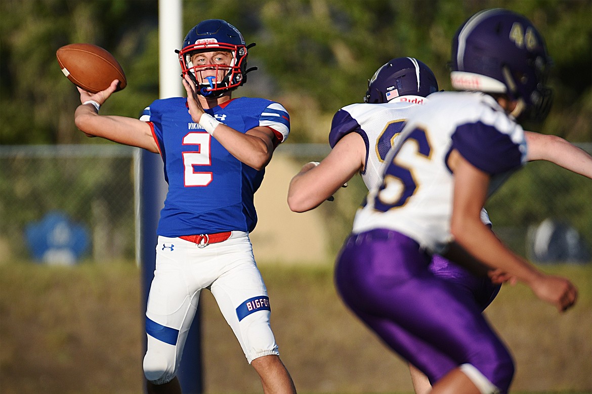 Bigfork quarterback Patrick Wallen (2) looks to throw in the first quarter against Cut Bank at Bigfork High School on Friday. (Casey Kreider/Daily Inter Lake)