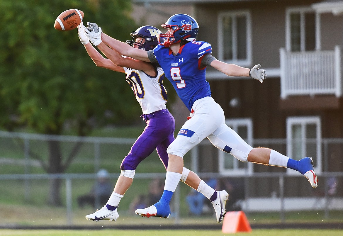 Bigfork defensive back Isak Epperly (9) deflects a pass intended for Cut Bank wide receiver Wyatt Berkram (80) in the second quarter at Bigfork High School on Friday. (Casey Kreider/Daily Inter Lake)