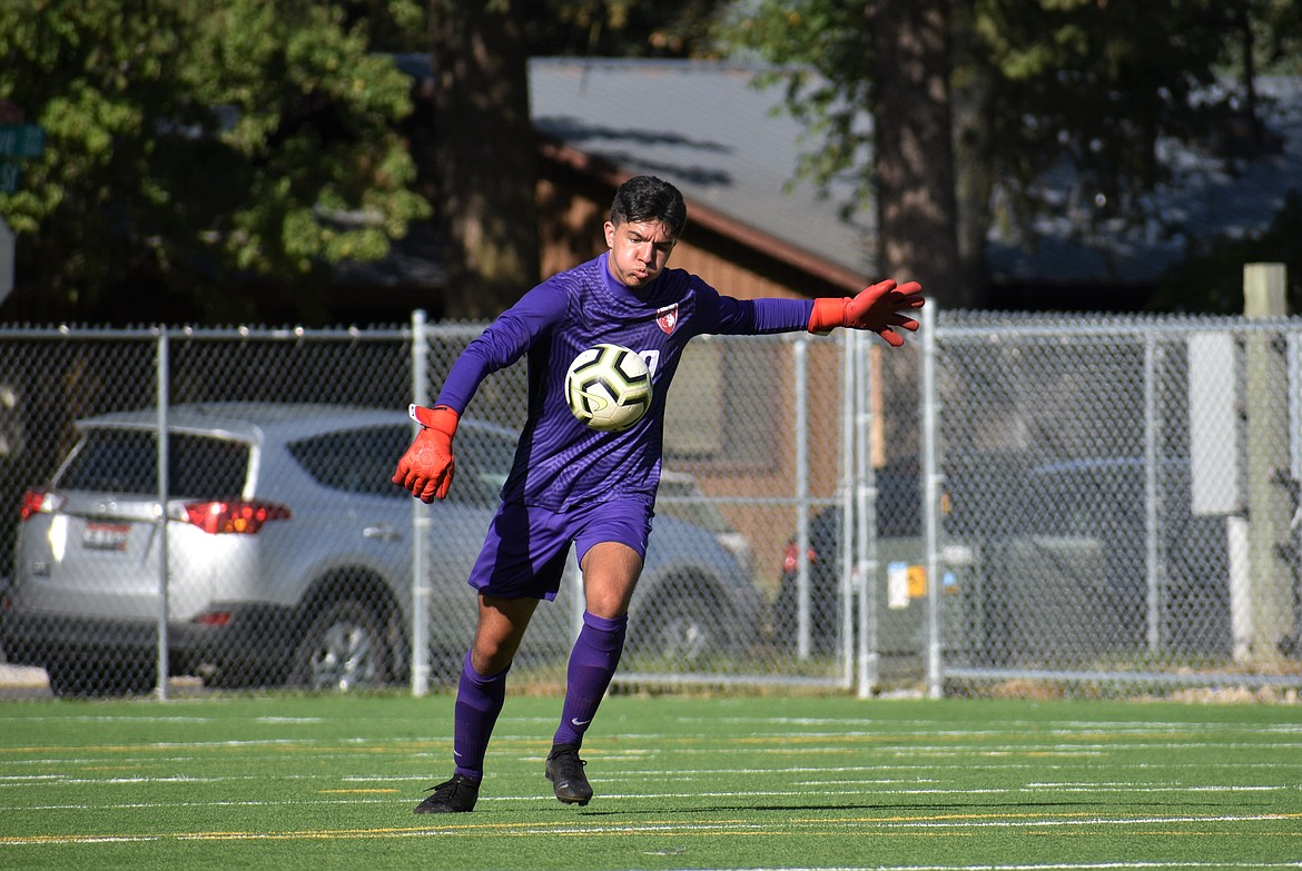 Sophomore goalkeeper Roman Jiles kicks the ball during a game against Post Falls on Aug. 25 at War Memorial Field.