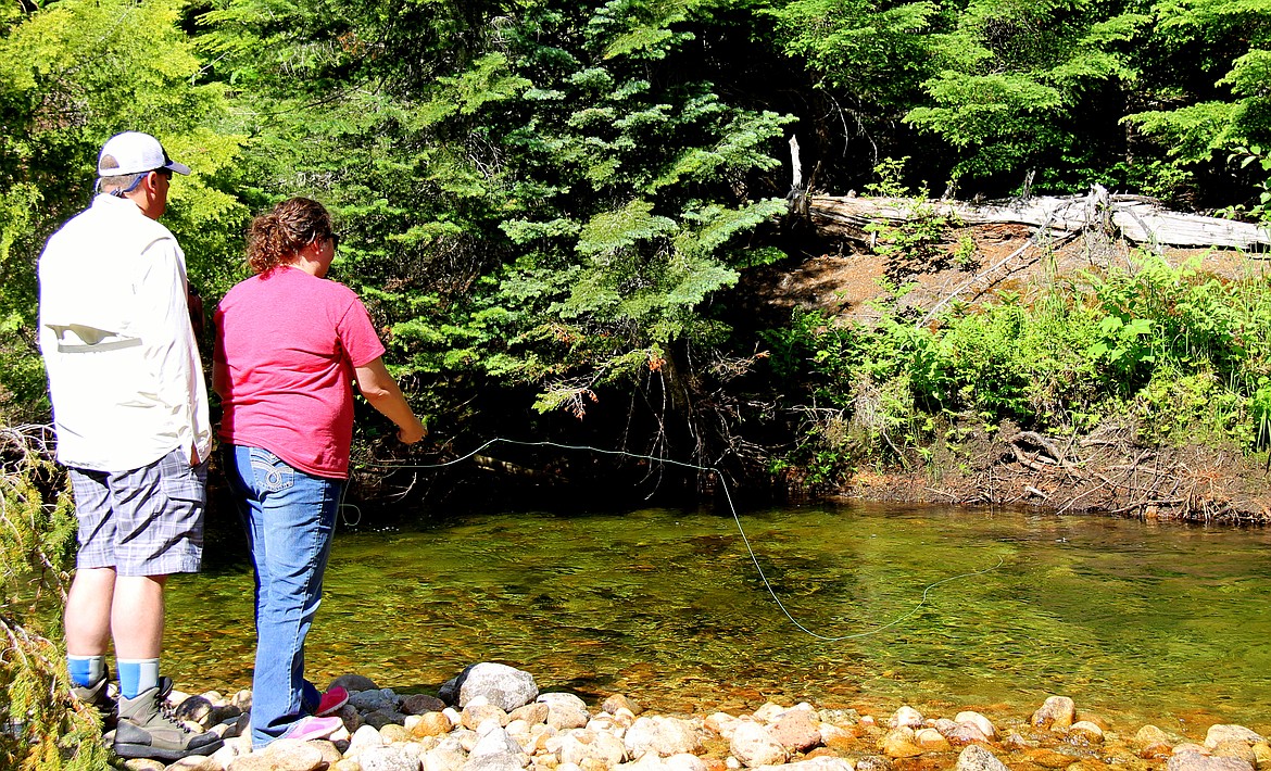 Will and Debbie Love pursuing cutthroat trout in Smith Creek