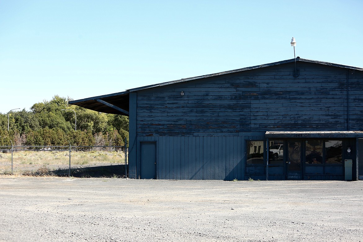 If approved by the city council on September 22, Moses Lake's managed homeless camp will be built on the corner of East Broadway Avenue and state Route 17 on what used to be a Penhallurick's lumber yard. The blue building, abandoned years ago, would likely have to be demolished, said Moses Lake police Chief Kevin Fuhr in an interview.