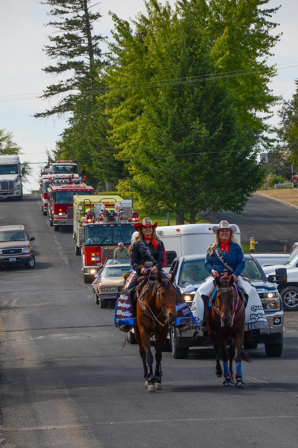 Othello Rodeo Queen Brianna Kinkade and Miss Moses Lake Roundup Queen Mykiah Hollenbeck lead the second half of the Ritzville Community Parade through the residential streets of the community.
