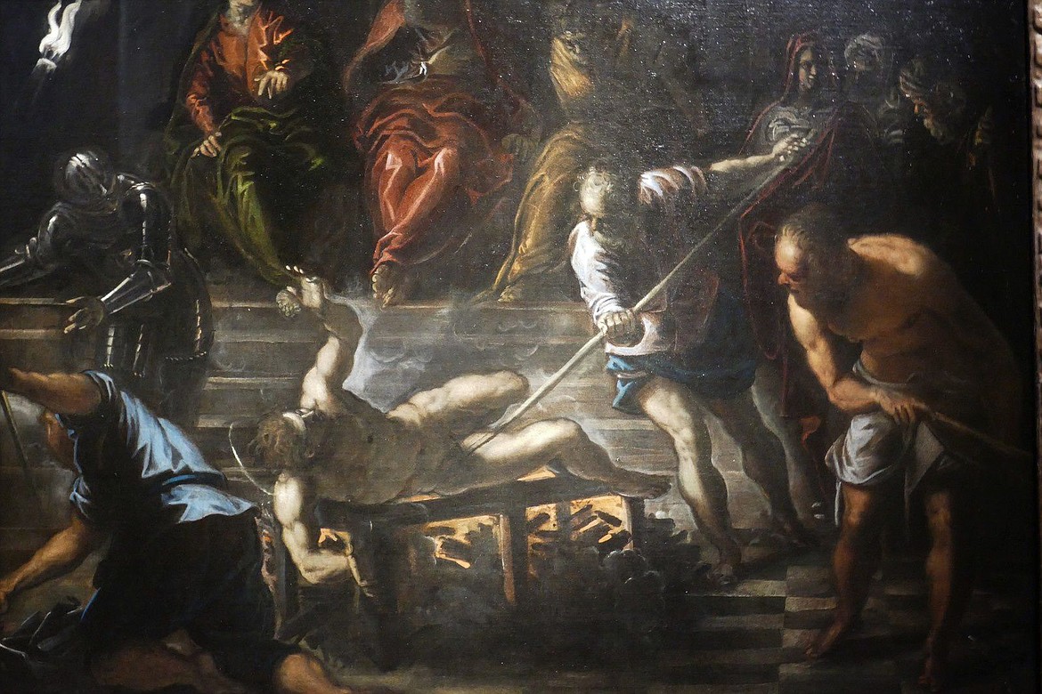 Painting by Tintoretto of St. Lawrence being martyred on a fire grill order by Roman Emperor Valerian (253-260 A.D.) in persecuting Christians.