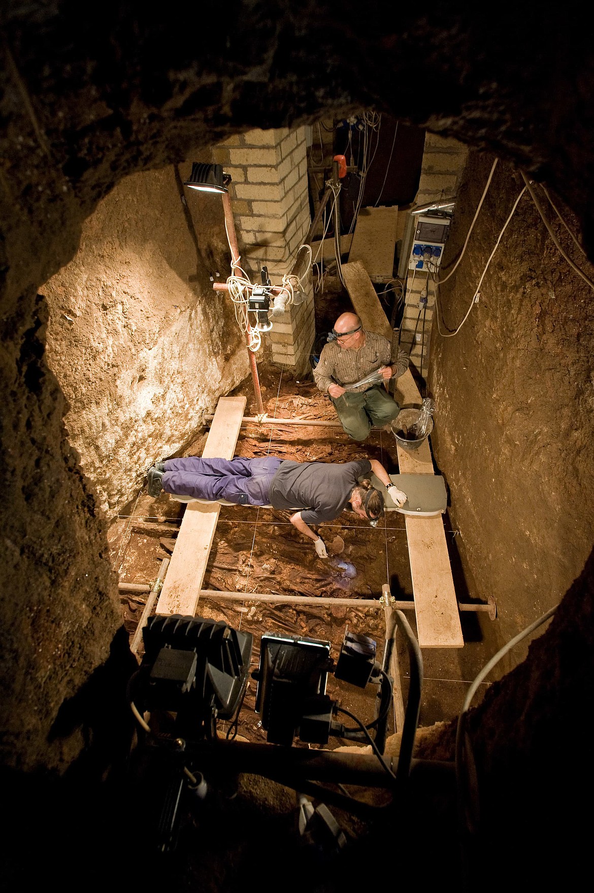 Excavating in the St. Peter and St. Marcellin catacombs beneath the ancient Via Labicana where 20,000 to 25,000 bodies were buried in the 4th century A.D. (2008).