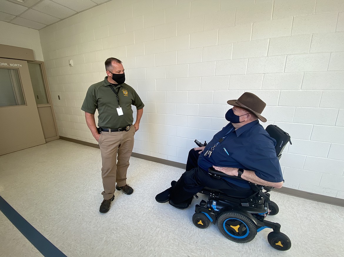 KCSO Captain John Holecek leads Commissioner Bill Brooks through the Kootenai County Jail on a routine quartile inspection of the facilities. (MADISON HARDY/Press)
