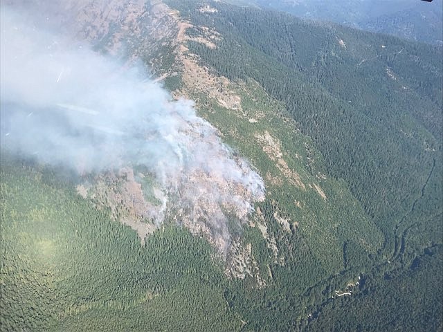 U.S. Forest Service firefighters are battling a human-started 150 acre wildfire in the South Callahan Drainage near Troy.