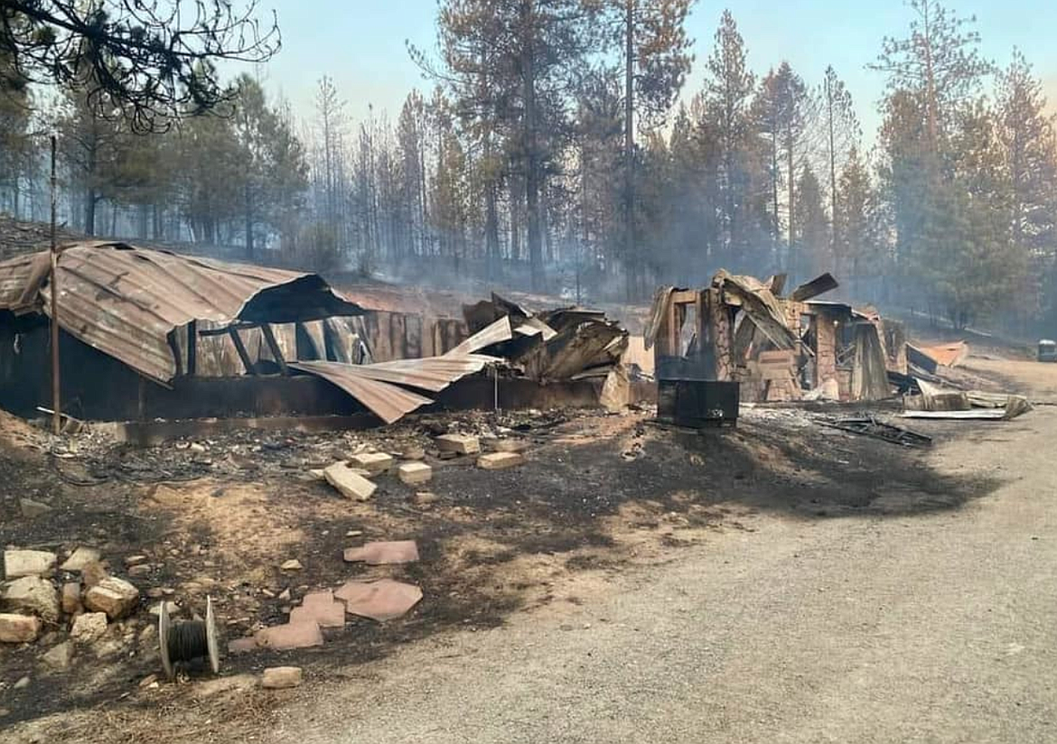 The Hunter 2 Fire that erupted Monday near Blanchard claimed one house, which happened to be the home of a deputy for the Kootenai County Sheriff's Office, his expecting wife and their young daughter.