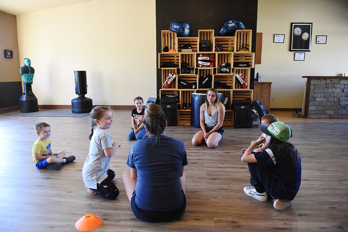 Jenee, left, and Renee Sandlin work with a group of kids in one of the youth classes at Mighty Mouse Muay Thai in Columbia Falls on Wednesday, Sept. 9. (Casey Kreider/Daily Inter Lake)