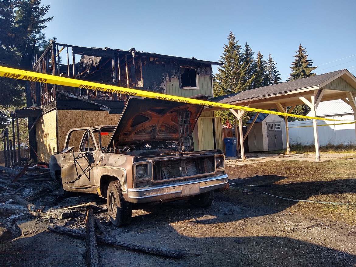 The fire early Friday morning destroyed a duplex and damaged a neighboring home.