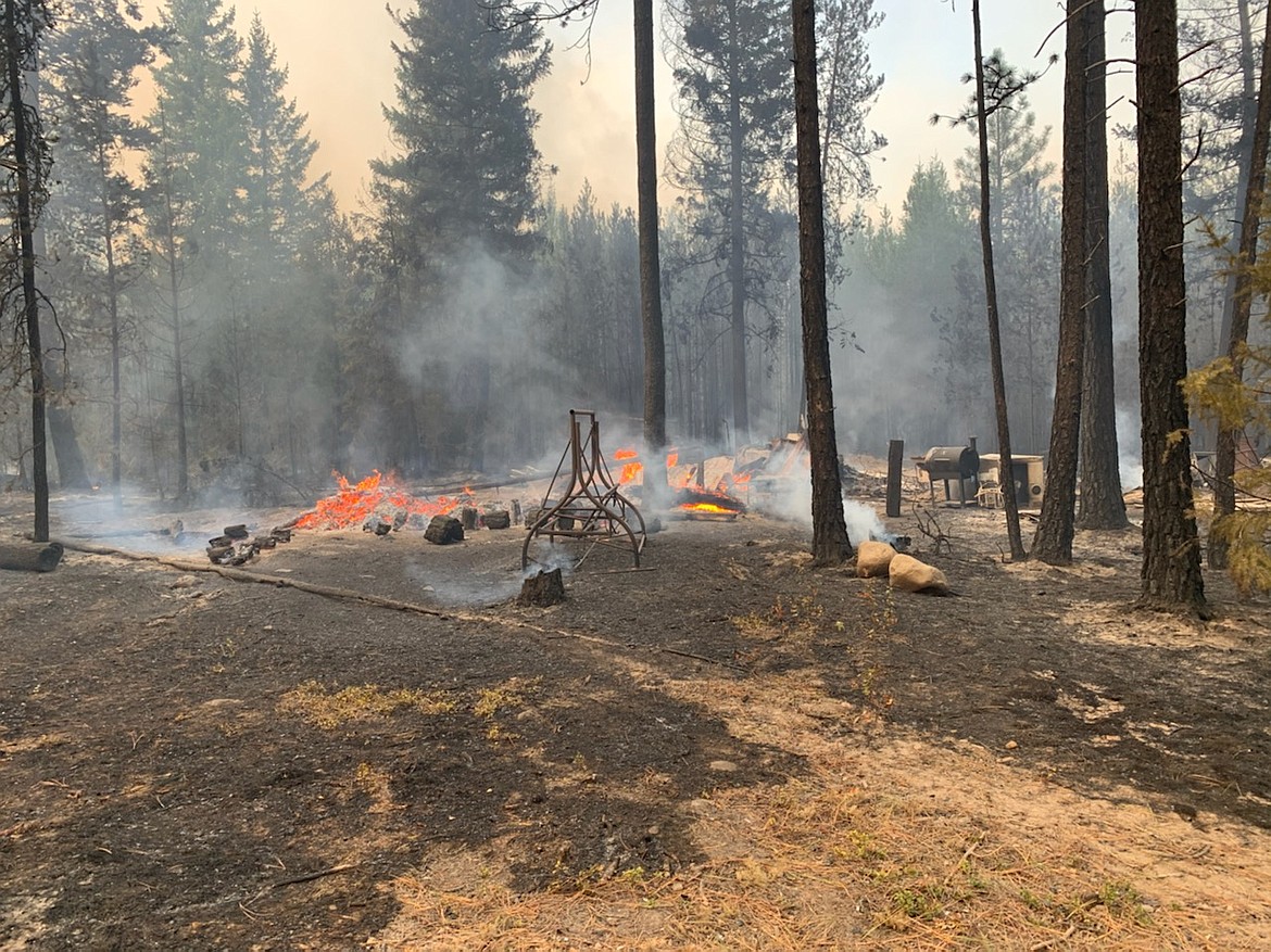 The Anundson family lived in a mobile home while they built their dream house. The Hunter 2 Fire that consumed 740 acres burned their work — along with their personal belongings — to the ground, leaving only the remains of this swingset. (Photo by Bill Anundson)