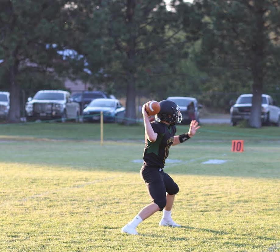 St. Regis quarterback Caleb Ball unleashes a pass in last Friday's game. (Kami Millender photo)