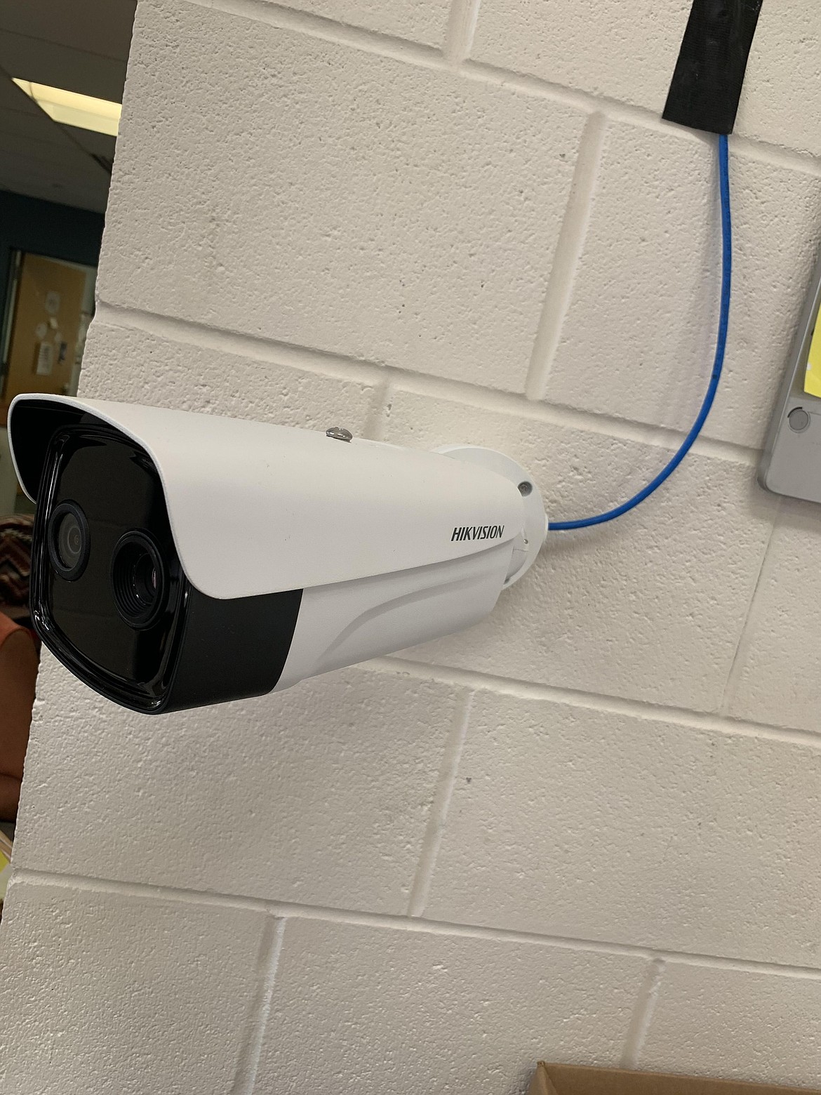 The Ninex Temp system reads a person’s temperature and checks whether they’re wearing a mask, then sends an alert to the superintendent, principal, secretary and nurse. The St. Ignatius School District has five of the devices.