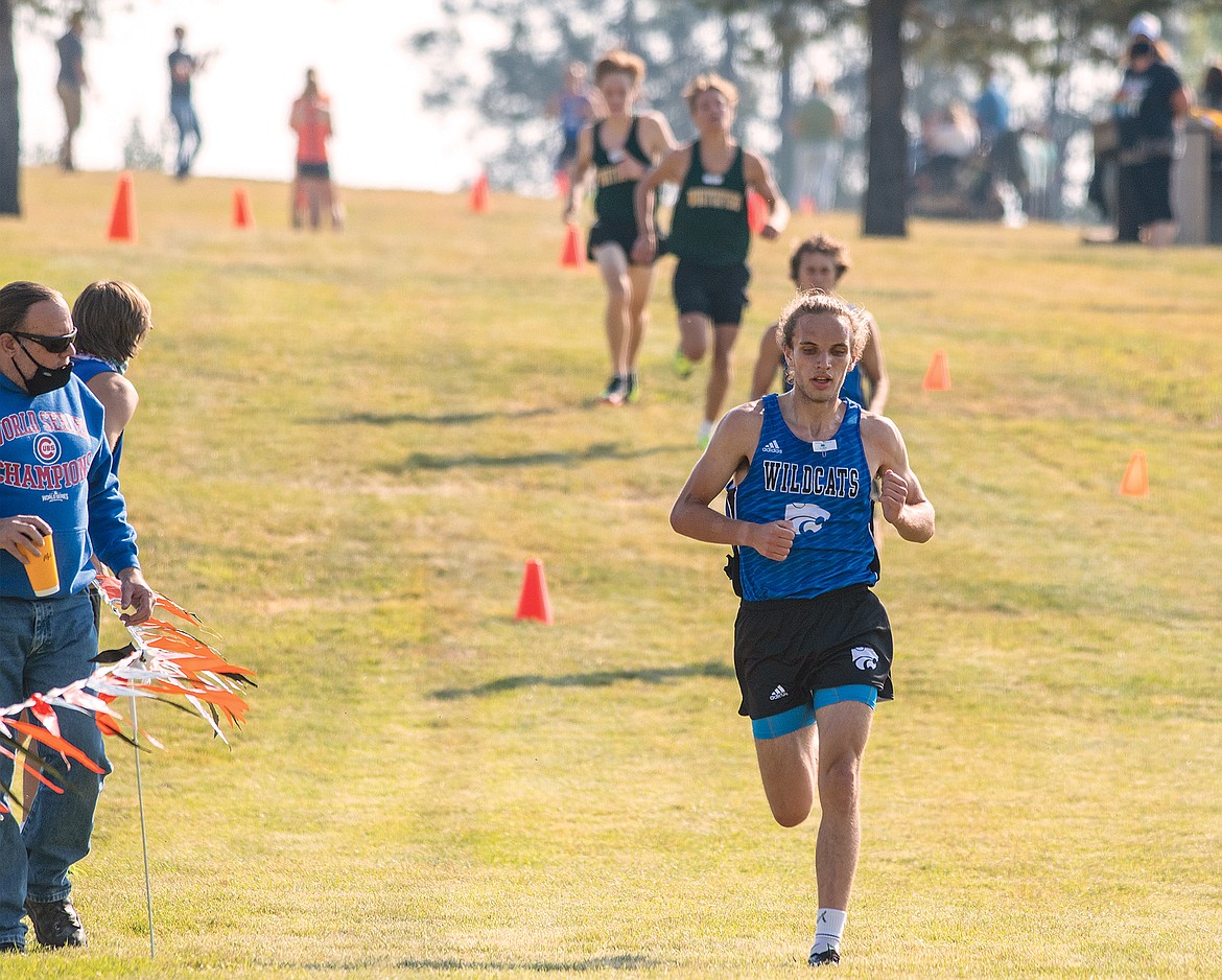 James Petersen broke away from the pack in the second half of the race to win it for the Wildcats.