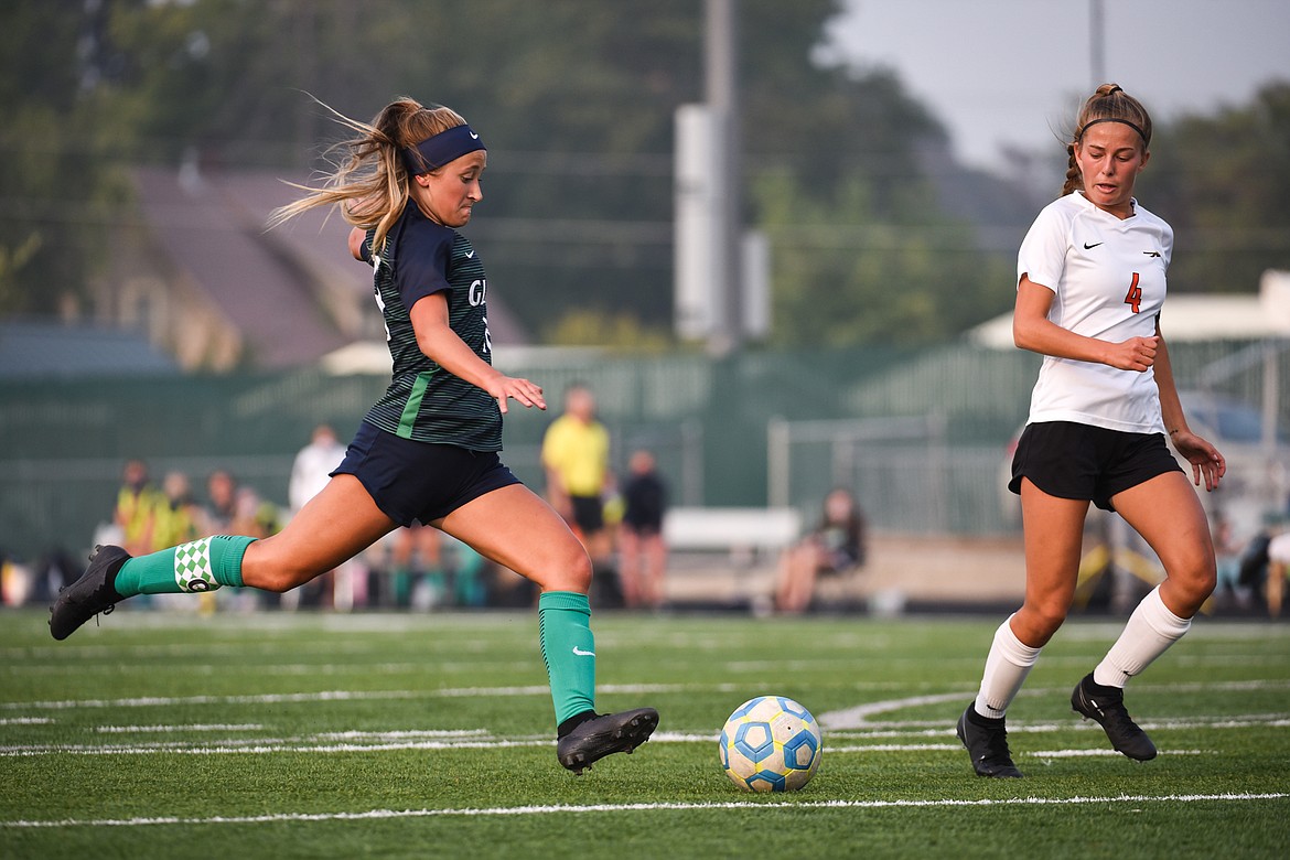 Glacier's Madison Becker (18) scores the lone goal of the match in the first half against Flathead during crosstown soccer at Legends Stadium on Tuesday. (Casey Kreider/Daily Inter Lake)