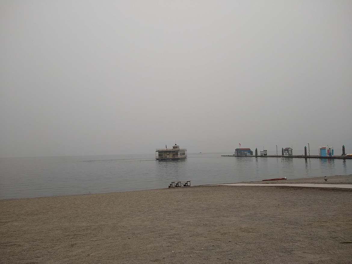 A cruise boat disappeared into the smoke over Coeur d'Alene Lake Monday afternoon.