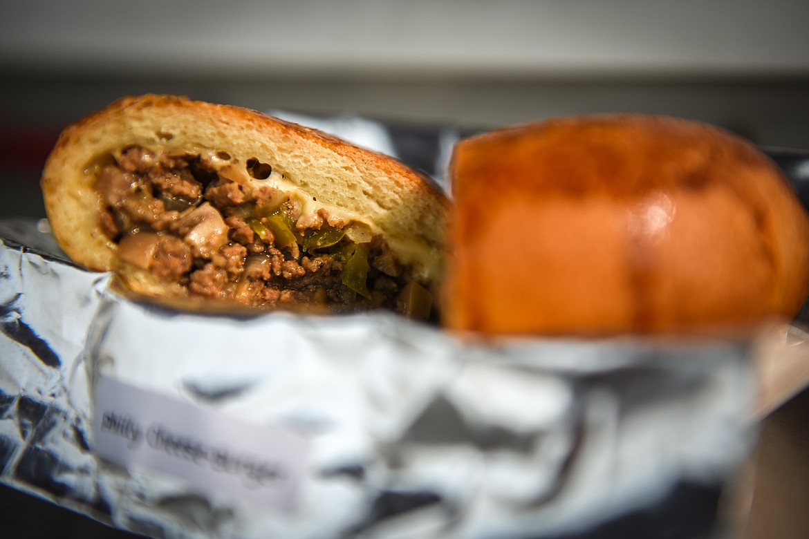 A Philly cheese burger piroshki at the Piroshki Palace food truck on Wednesday, Sept. 16. (Casey Kreider/Daily Inter Lake)