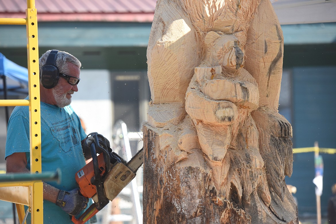 Todd Coats, and Montana-based artist, wields his saw the Kootenai Country Montana "Clash of the Carvers" event on Sept. 11. The chainsaw carving competition drew sculptors to Libby from around the globe.
