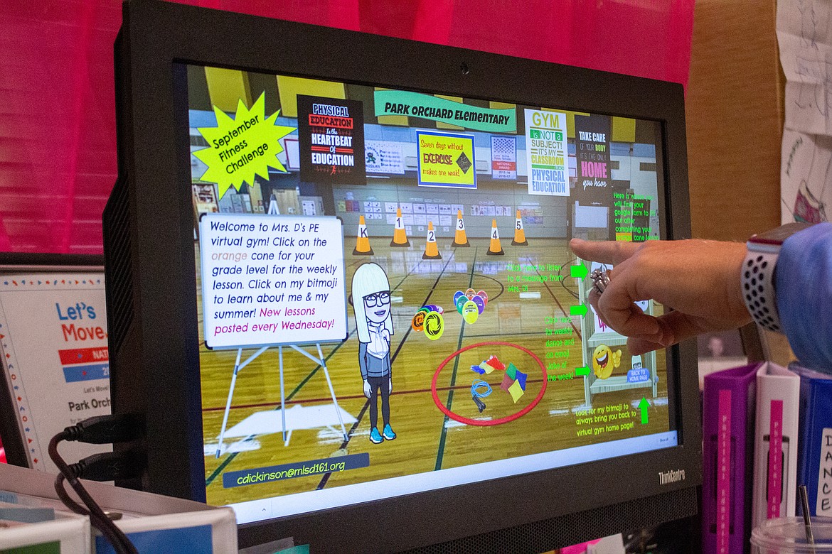 Park Orchard Elementary teacher Cyndi Dickinson showcases one of the presentations she's created for students to access remotely to help them learn about nutrition and health tips while at home to begin the year.