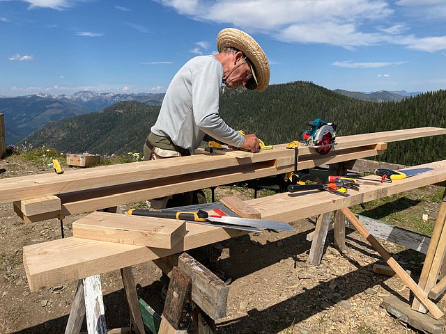 Chuck Manning and members of the Northwest Montana Chapter of the Forest Fire Lookout Association use a variety of skills to include projects which can include woodwork, painting and more. (photo provided)