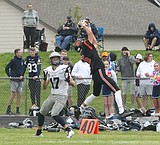 Post Falls gets picky: Five second-half interceptions — three by Clark — propel Trojans past Lake City