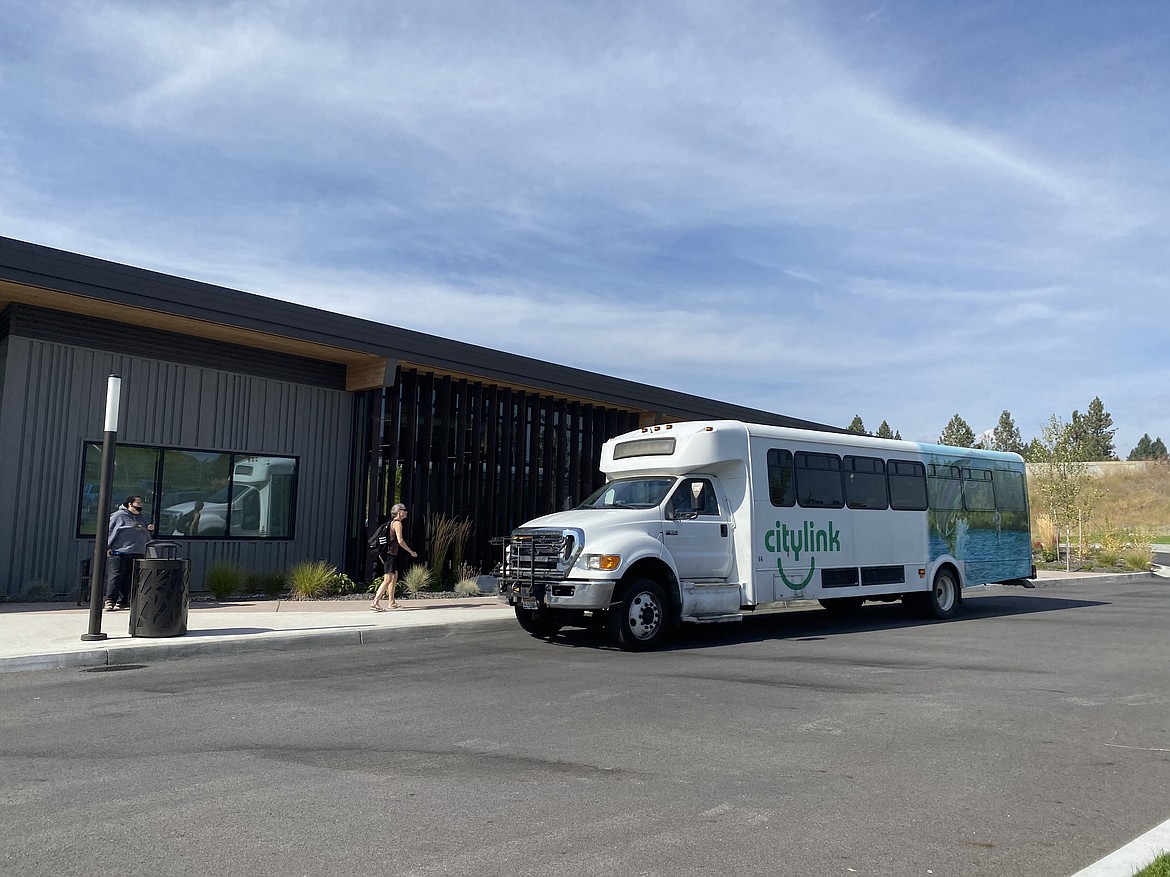 Riders wait for their ride on the Riverstone Transit Center's Citylink buses, which could become a new link to downtown Spokane. (MADISON HARDY/Press)