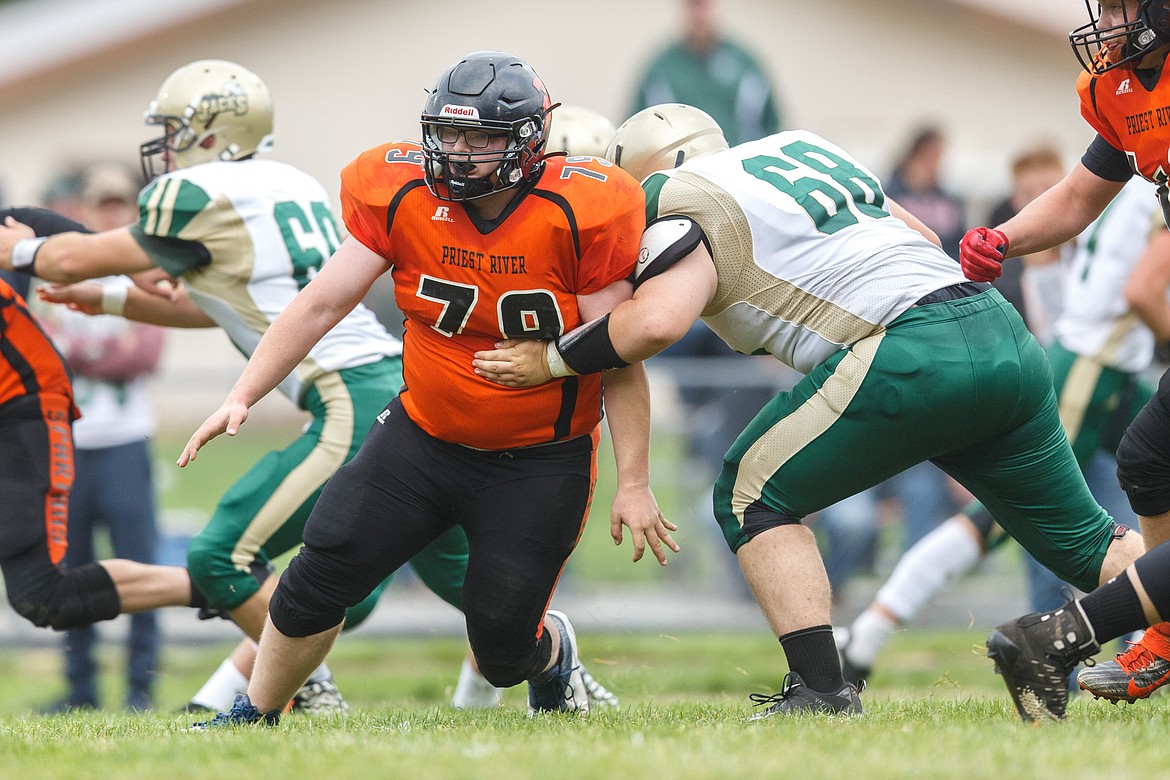 Senior Kent Alexander breaks through the St. Maries offensive line during a game at PRLHS on Sept. 19.