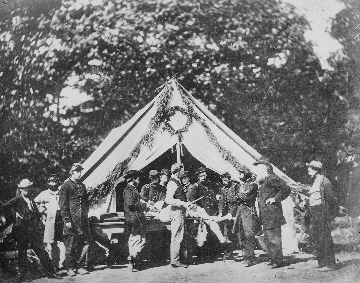 Dorothea Dix and her nurses served at the Gettysburg Battle where more than 33,000 were wounded, this image depicting the start of an amputation in a Union operating tent at Camp Letterman, Gettysburg, Pa.