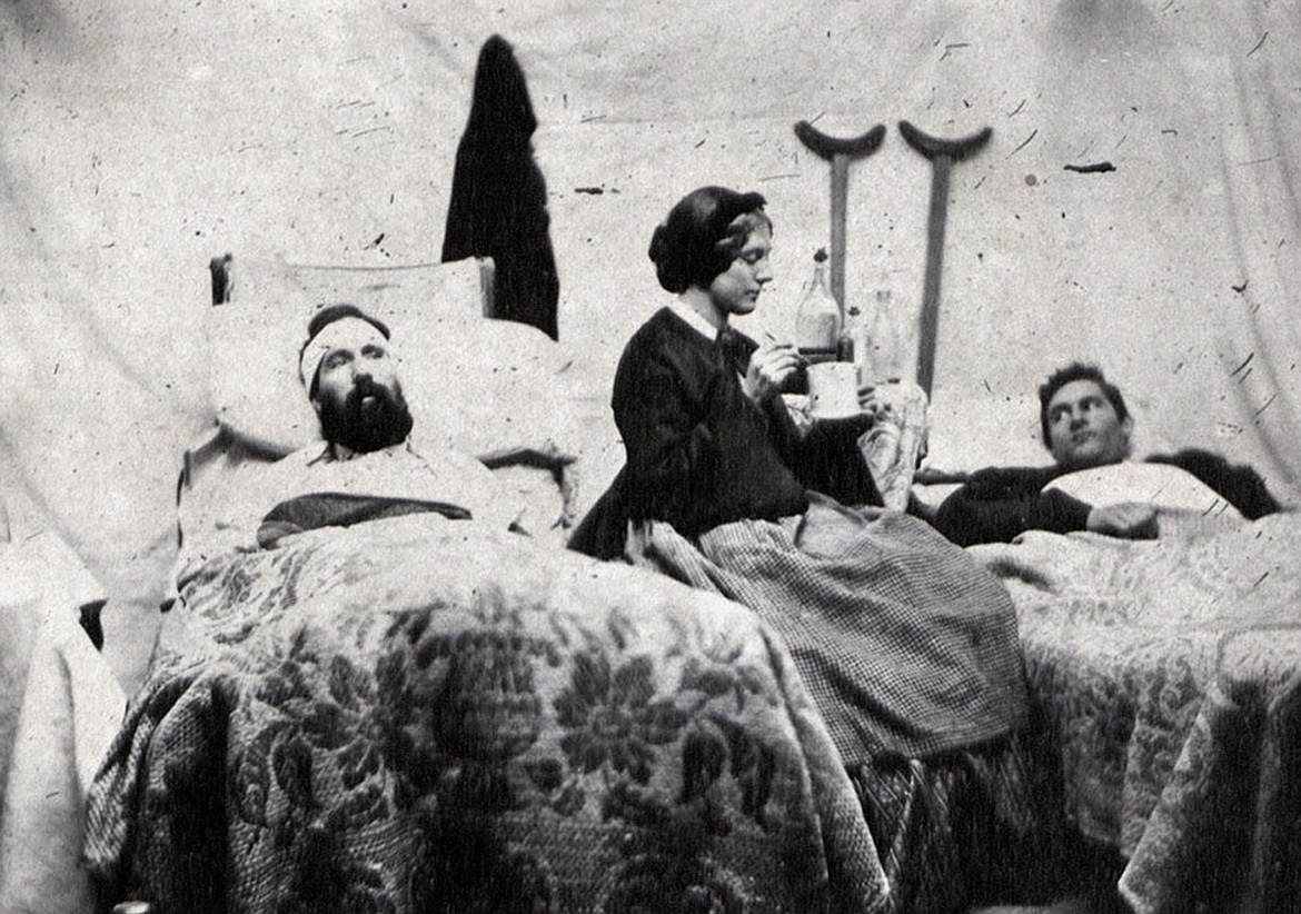 Civil War nurse Annie Bell tending to the wounded in a Union Army hospital in Nashville, Tenn. (1864).
