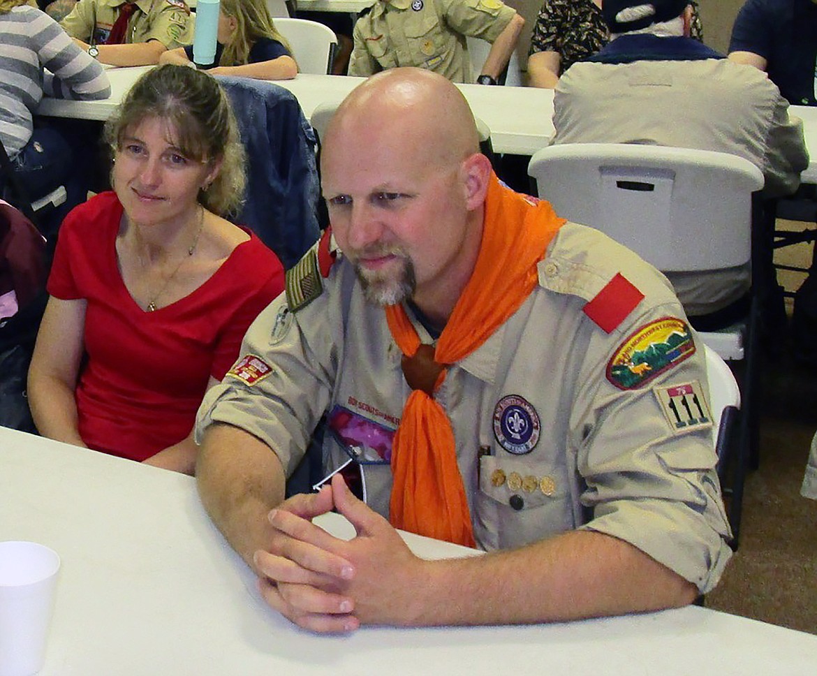 Tammy and Phil Voelz attend a graduation dinner of three Boy Scouts from Troop 111 at the National Youth Leadership Training program.