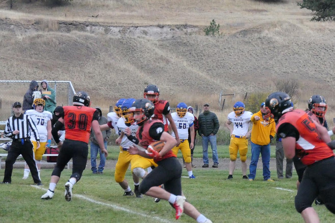 Plains football player Gavin Regalado broke free for one of several touchdowns against Victor in a homecoming win last Friday. (Chuck Bandel/Valley Press)