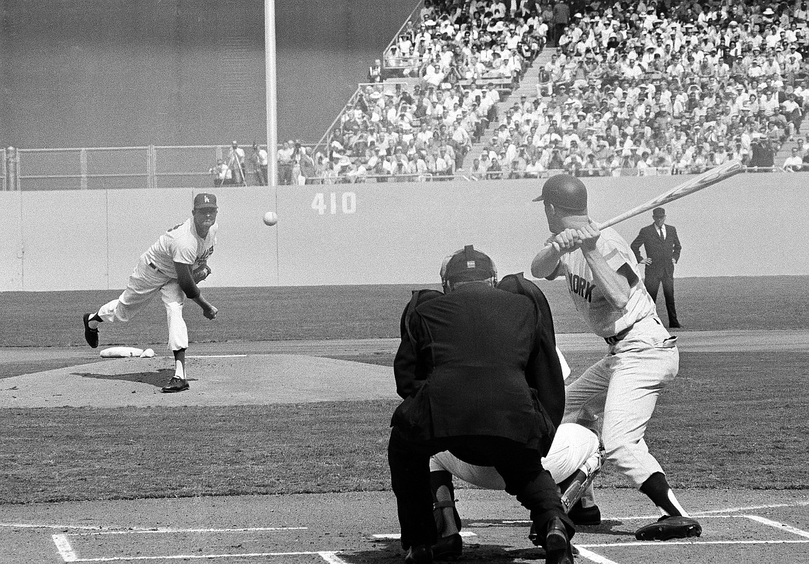 Associated Press
Don Drysdale of the Dodgers fires the first pitch to Tony Kubek of the Yankees in the third game of the 1963 World Series at Dodger Stadium in Los Angeles.