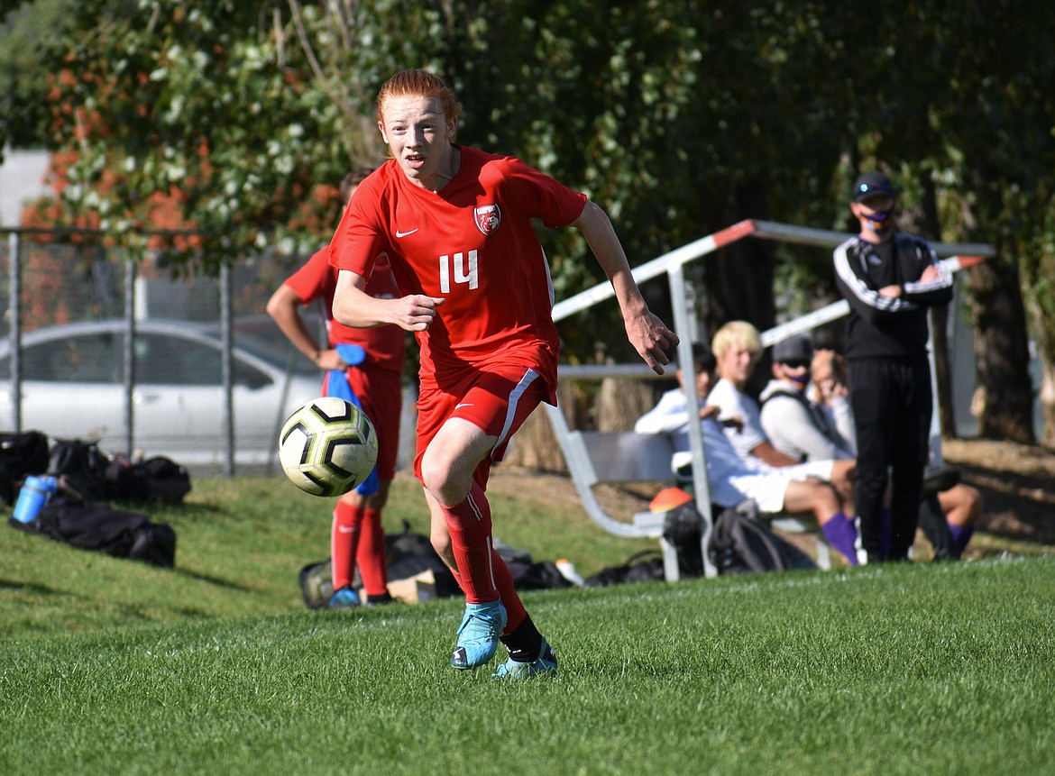 Junior Canyon Nash chases down the ball during the second half of Saturday's game against Lewiston at Pine Street Field. He had a goal and an assist in the match.