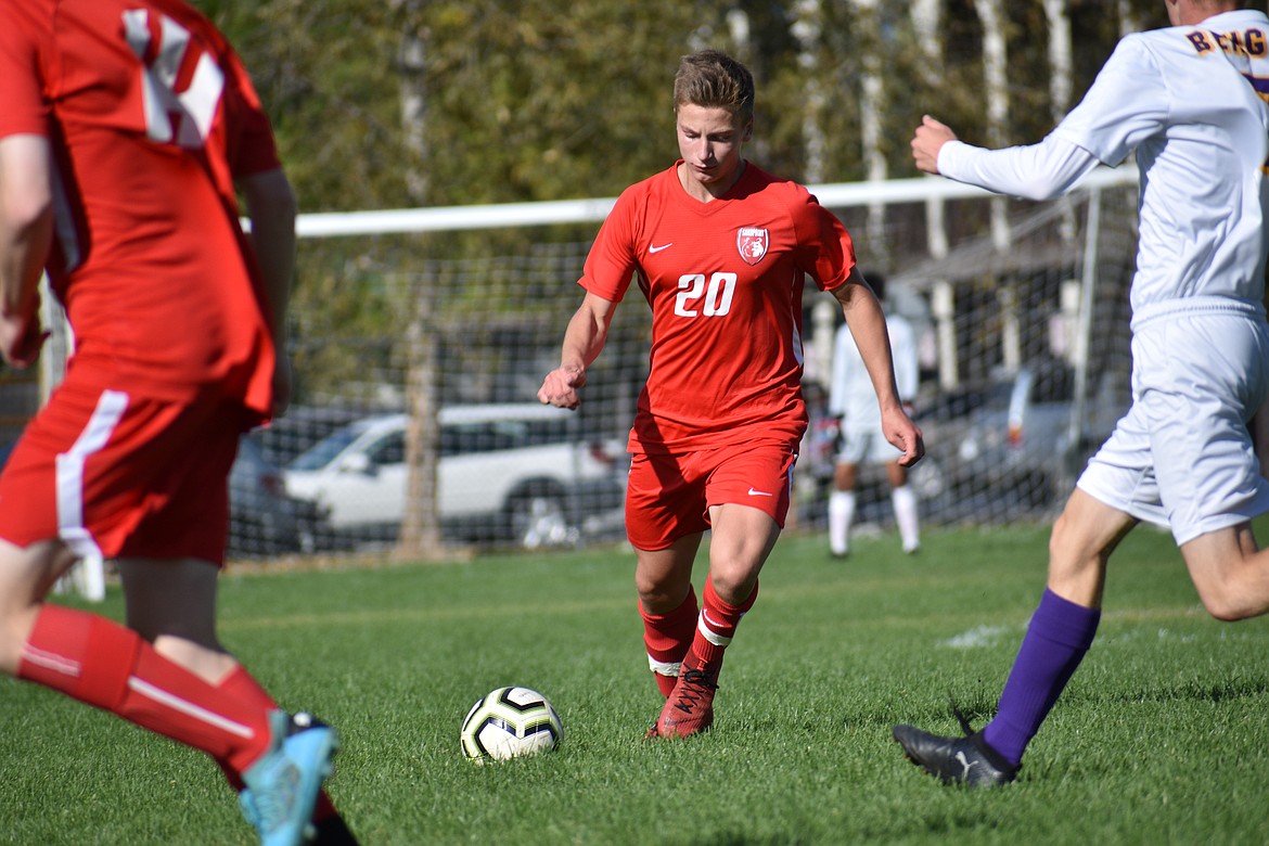 Senior defender Parker Prior looks for an open teammate during a match against Lewiston on Sept. 26 at Pine Street Field.