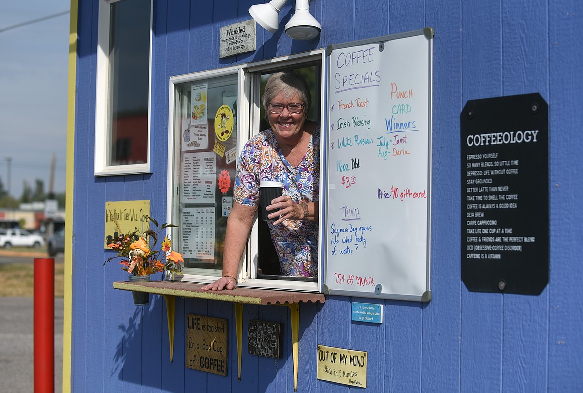 Leigh Thorson is pictured at her drive-thru coffee business Jo Mama's in Evergreen on Monday, Sept. 21. What she enjoys most about the job are all the people she gets to meet. (Hilary Matheson/Daily Inter Lake)