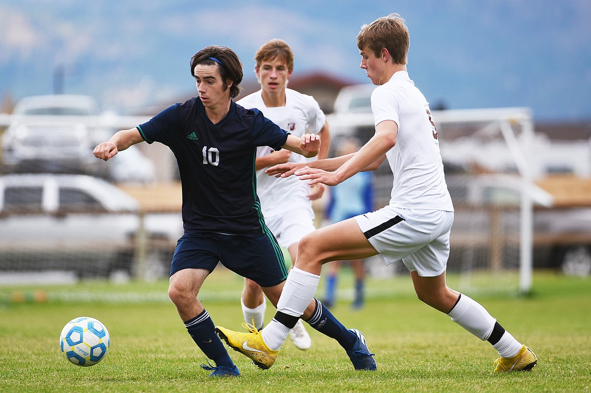 Glacier’s Zane Elliott (10) moves the ball upfield against Helena Capital at Glacier High School on Saturday. (Casey Kreider/Daily Inter Lake)