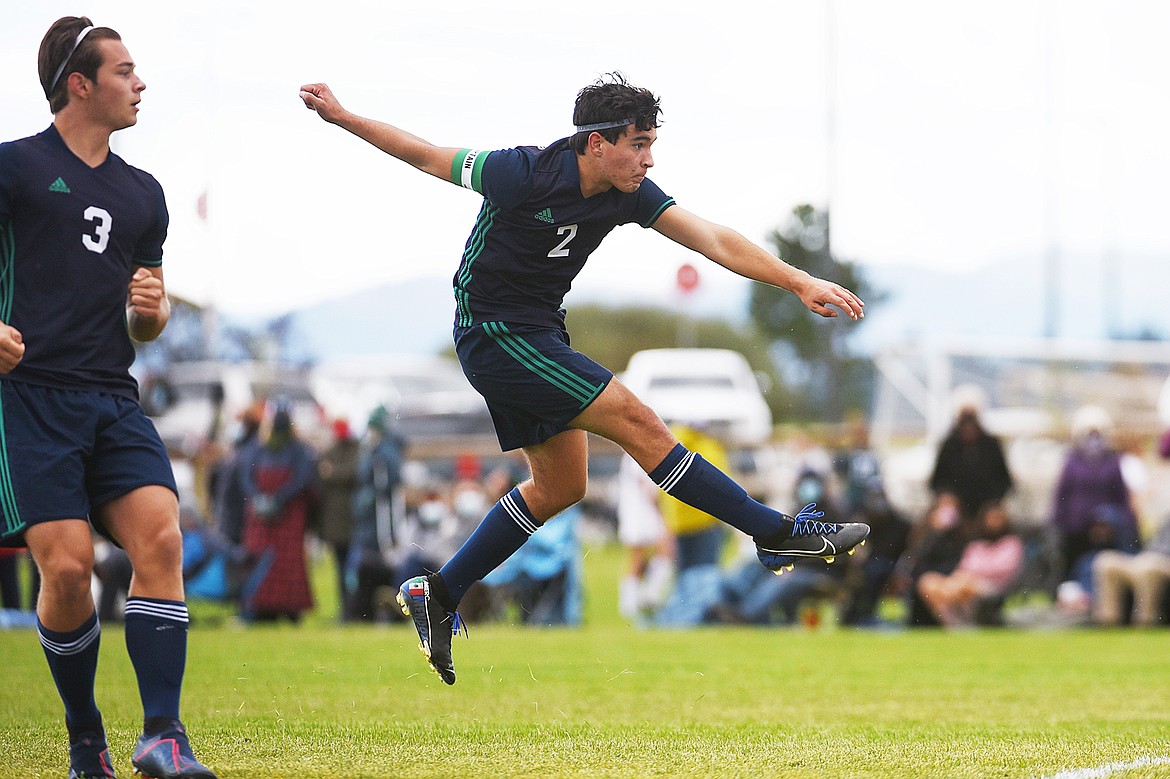 Glacier’s Diego Mendoza (2) takes a free kick in the first half against Helena Capital at Glacier High School on Saturday. (Casey Kreider/Daily Inter Lake)