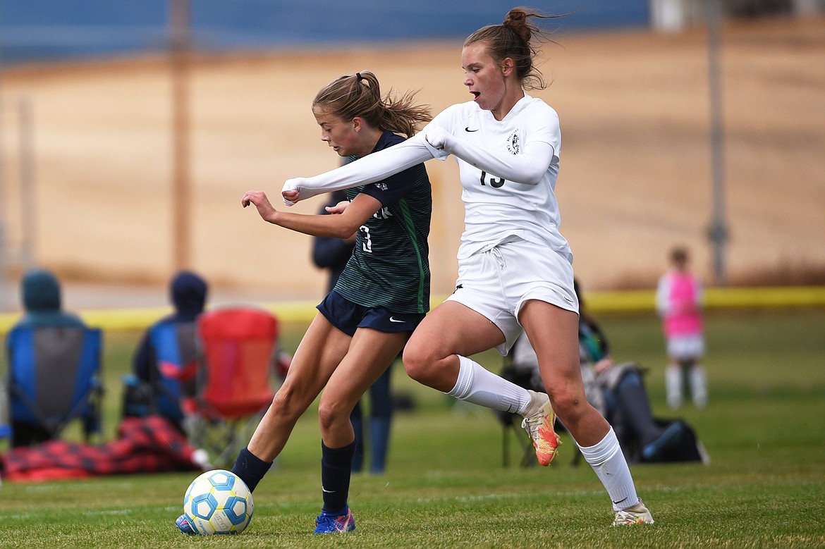 Glacier’s Reagan Brisendine (3) scores her second of two goals in the second half against Helena Capital at Glacier High School on Saturday. (Casey Kreider/Daily Inter Lake)