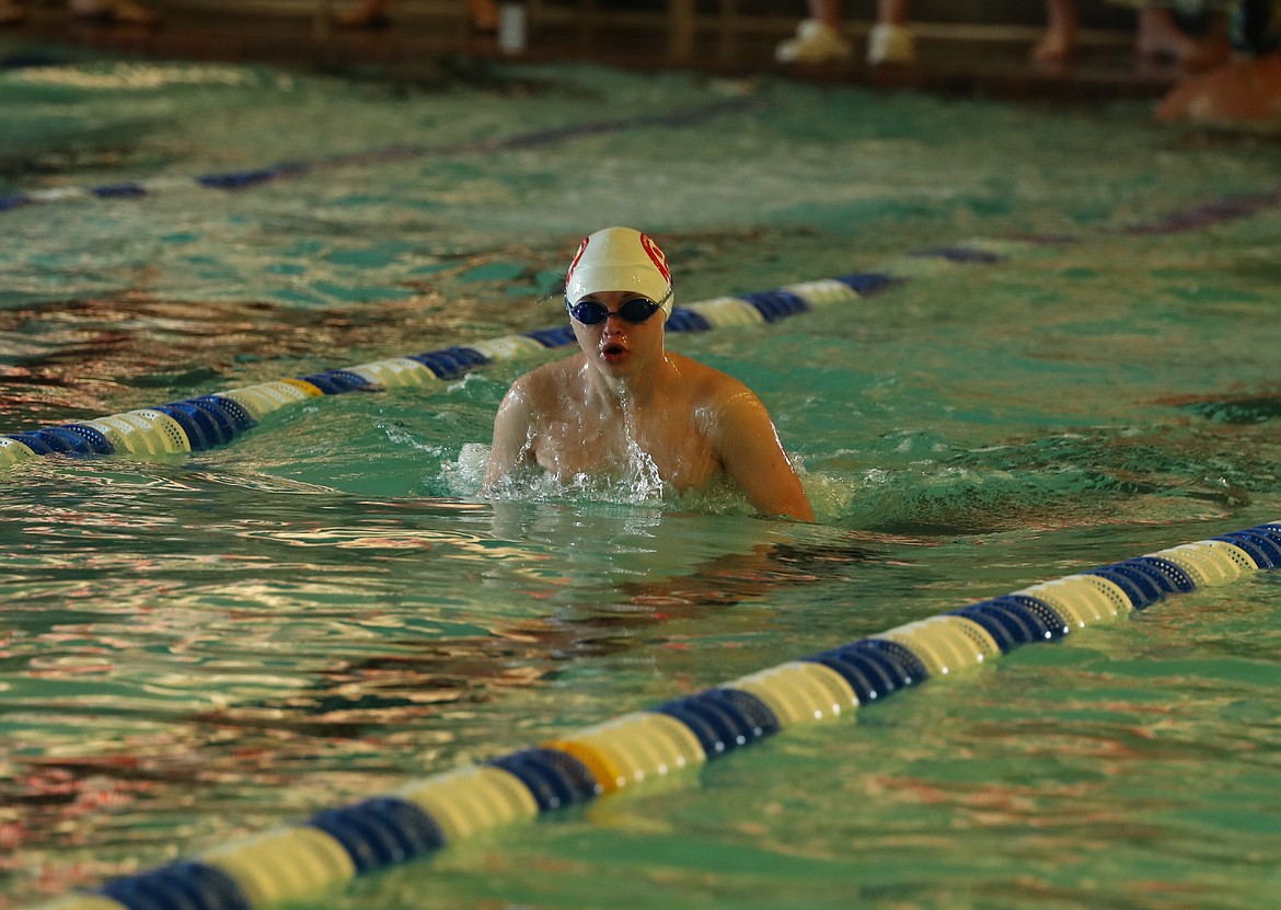 Senior Campbell Wyman swims in the 200 medley relay on Saturday.