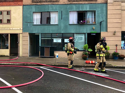 Shoshone County Fire District No. 1 firefighters air out the Brooks, as it was filled with smoke prior to their arrival.