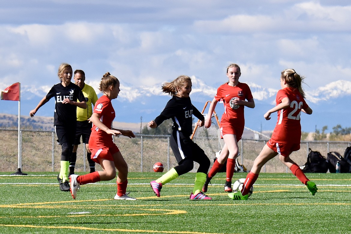 Photo by SUZI ENTZI
The Thorns North FC 08 Girls Red soccer team traveled to Bozeman, Mont., for what turned out to be a shutout weekend. On Saturday the Thorns played two games. First they played Real Billings 08G Silver and won 1-0. Cameron Fischer had the goal with Alli Carrico assisting. Their second game they beat Billings United 08G Pink 4-0. Alli Carrico had one goal and two assists, and Cameron Fischer, Sloan Waddell and Kamryn Kirk each had a goal. Ella Pearson had an assist. On Sunday the Thorns played Gallatin Elite 08G and won 5-0. Alli Carrico, Isabella Grimmett, Kambrya Powers, Nora Ryan and Ella Pearson each had one goal. Adysen Robinson, Cameron Fischer and Alli Carrico each had an assist. Macy Walters and Adysen Robinson defended the goal for the Thorns during the weekend. Thorns (in red) pictured from left are Avry Wright, Cameron Fischer and Sloan Waddell.