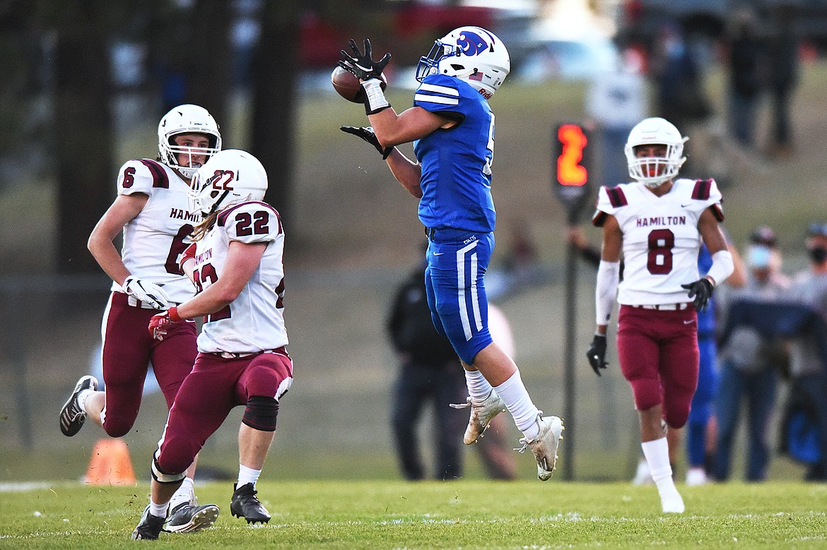 Columbia Falls running back Isaiah Roth (5) holds onto a reception in the first quarter against Hamilton at Satterthwaite Memorial Field in Columbia Falls on Friday. (Casey Kreider/Daily Inter Lake)