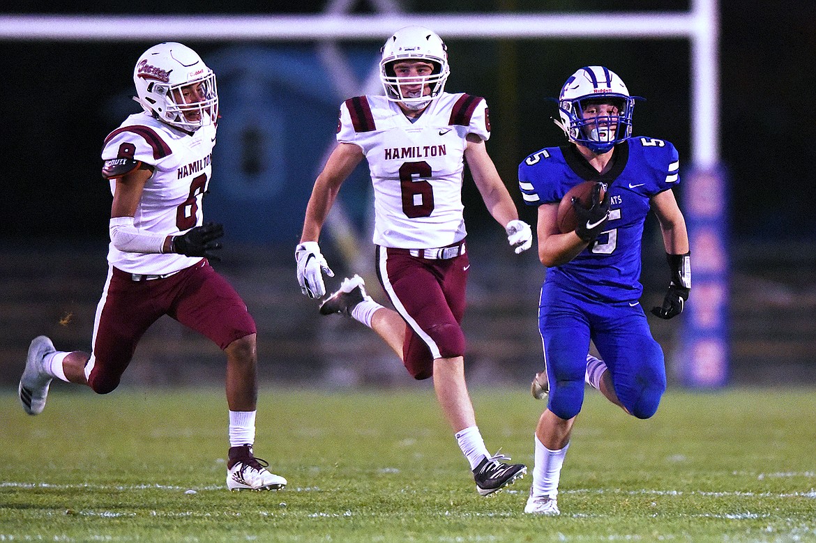 Columbia Falls running back Isaiah Roth (5) breaks a long run from scrimmage in the first half against Hamilton at Satterthwaite Memorial Field in Columbia Falls on Friday. (Casey Kreider/Daily Inter Lake)