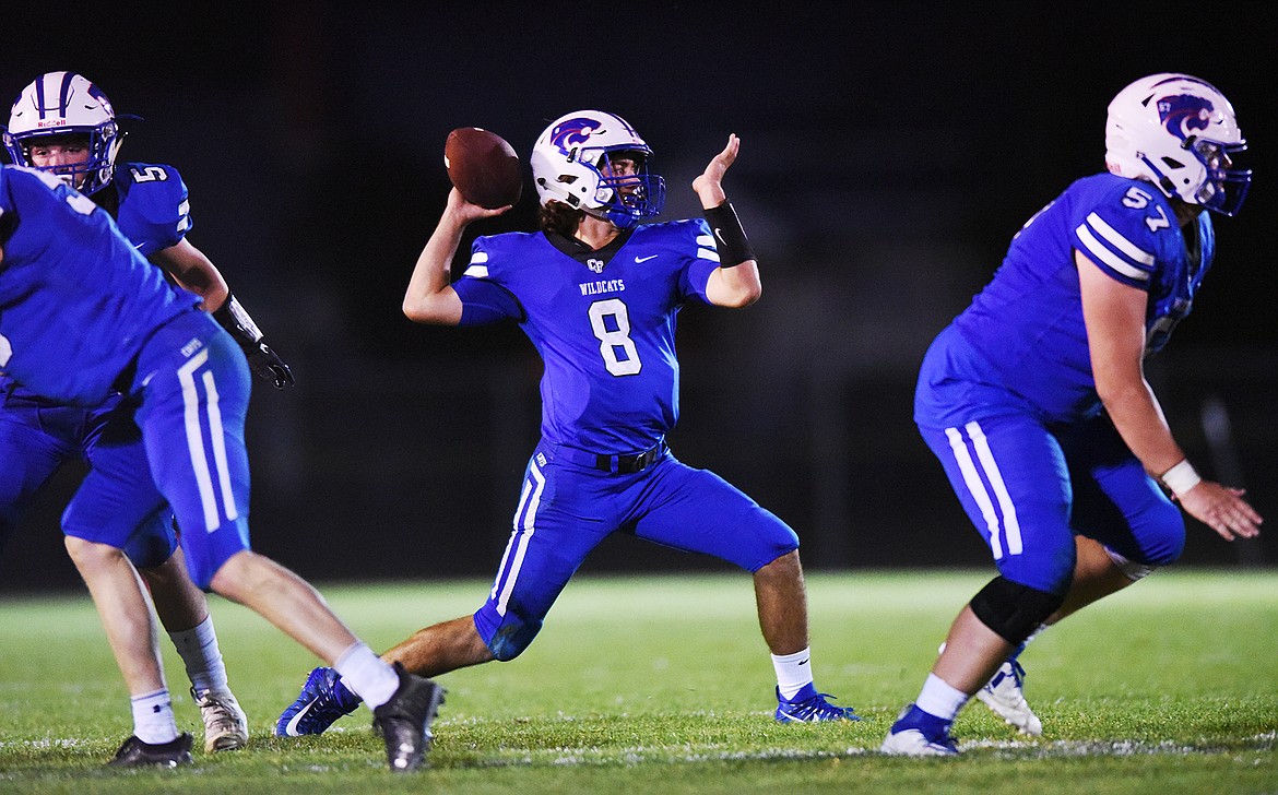 Columbia Falls quarterback Mason Peters (8) looks to throw in the first half against Hamilton at Satterthwaite Memorial Field in Columbia Falls on Friday. (Casey Kreider/Daily Inter Lake)