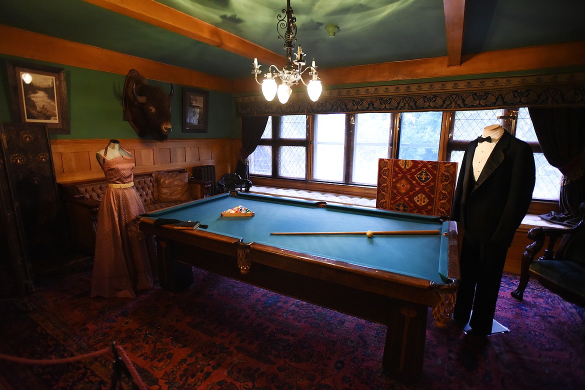 The shoulder mount of Kalispell Chief, the Conrads’ favorite bull who died of natural causes at age 32, watches over the Billiards Room. Friday, Sept. 25. (Casey Kreider/Daily Inter Lake)