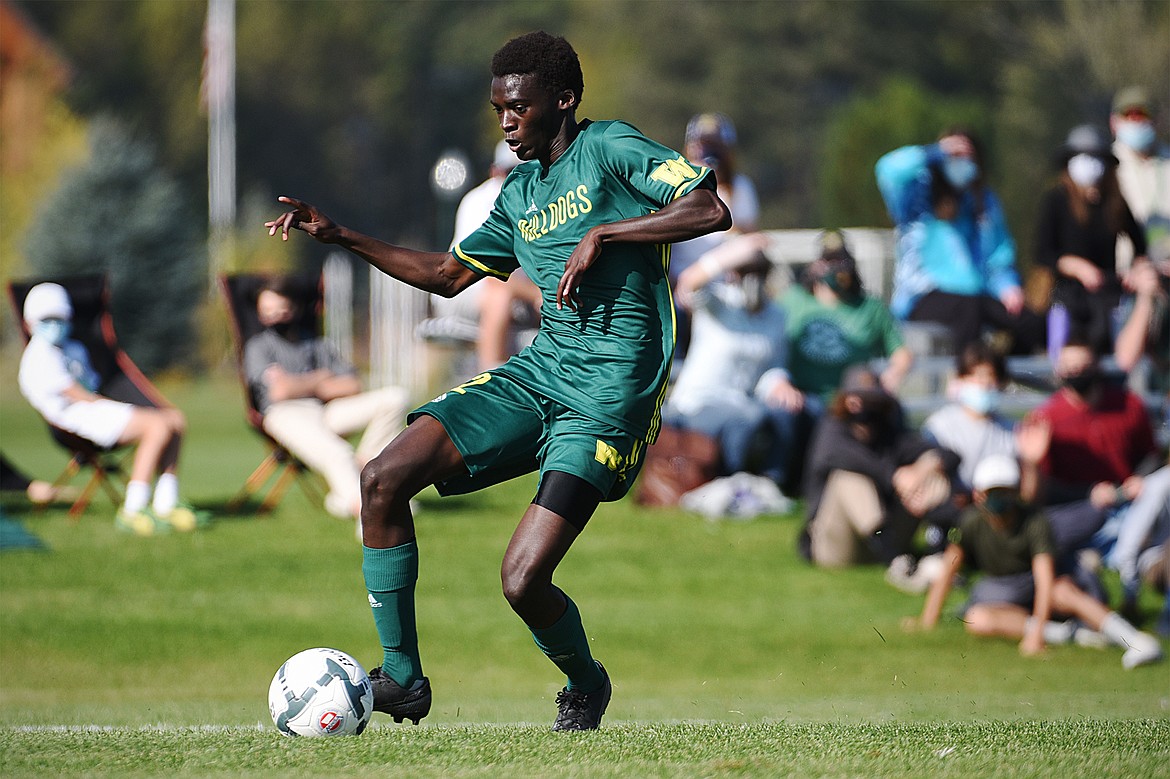 Whitefish’s Marvin Kimera (22) scores a second half goal against Columbia Falls at Smith Fields in Whitefish on Saturday. (Casey Kreider/Daily Inter Lake)
