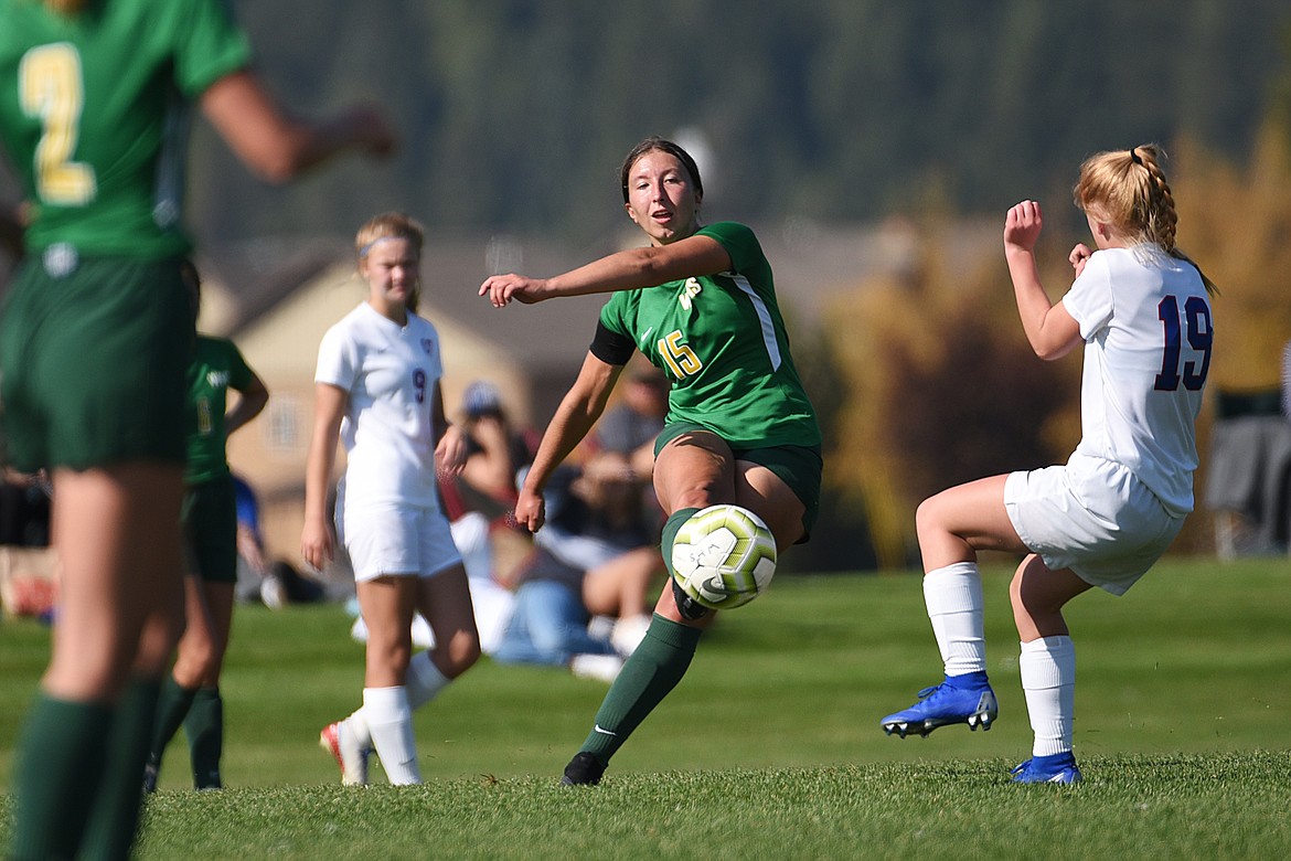Whitefish’s Anna Akey (15) looks to pass in the second half against Columbia Falls at Smith Fields in Whitefish on Saturday. (Casey Kreider/Daily Inter Lake)