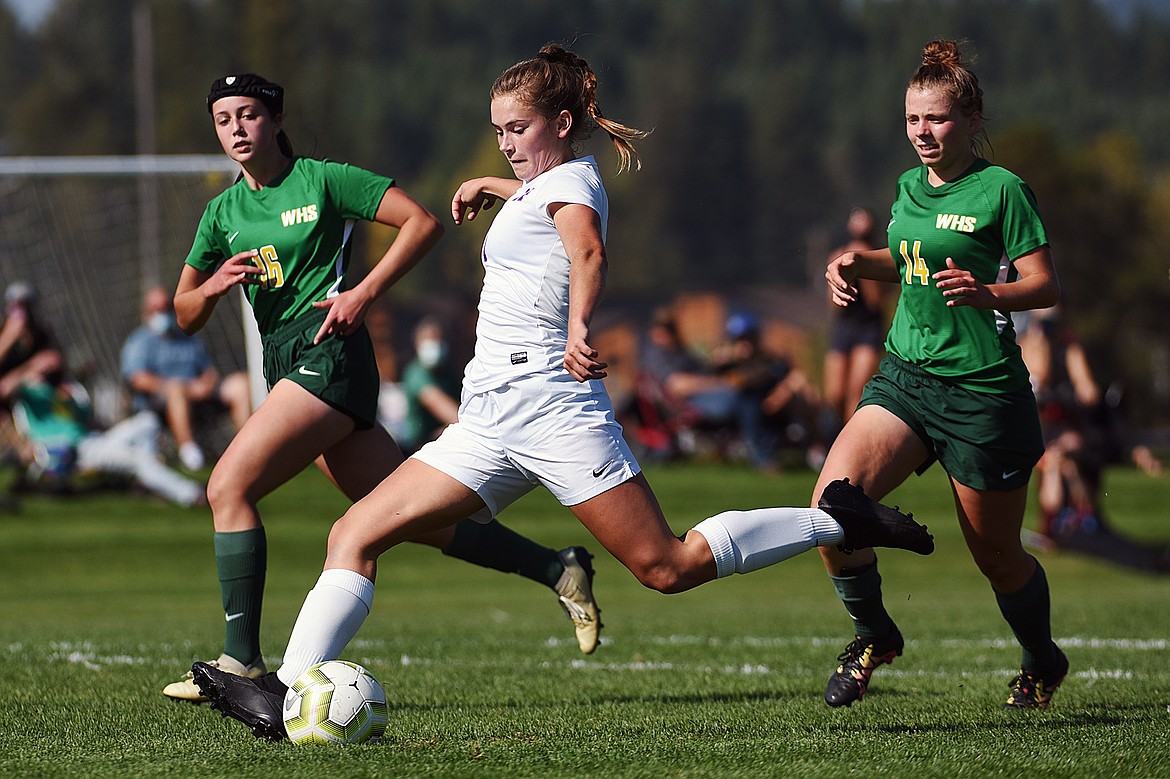 Columbia Falls’ Maddie Robison (7) looks to shoot in the first half against Whitefish at Smith Fields in Whitefish on Saturday. (Casey Kreider/Daily Inter Lake)